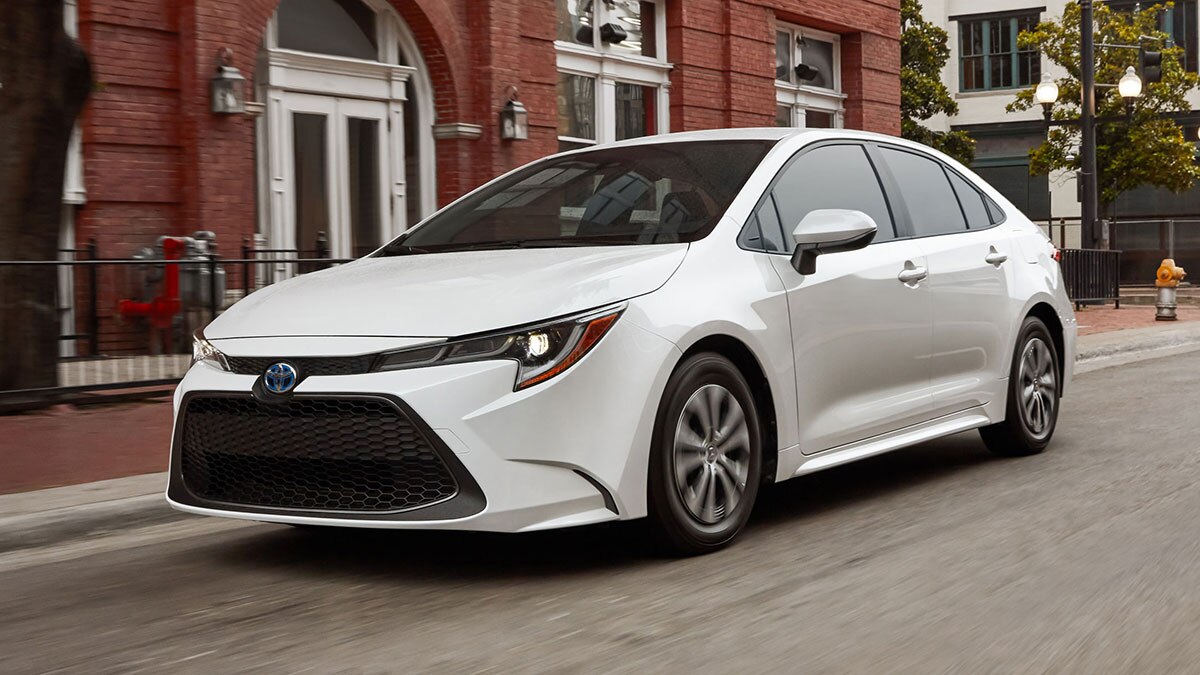 2023 Toyota Corolla Hybrid in white.